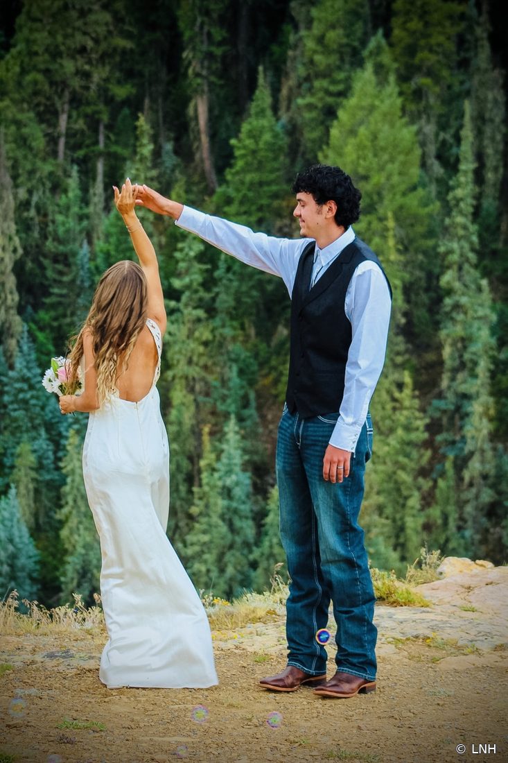 A couple dancing outdoors