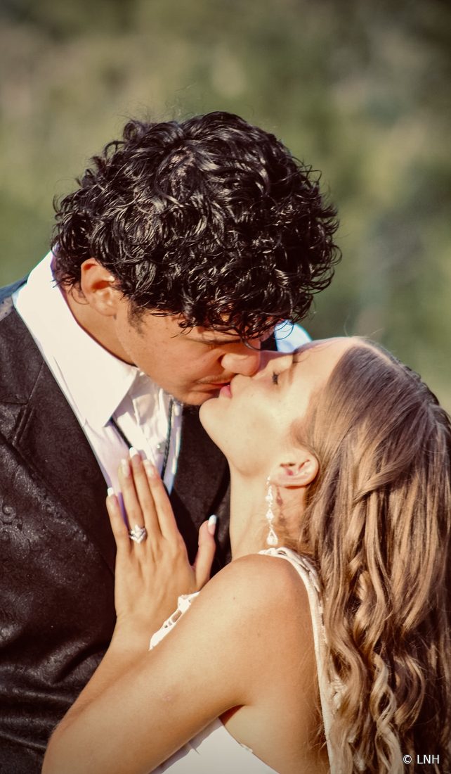 A couple sharing a kiss